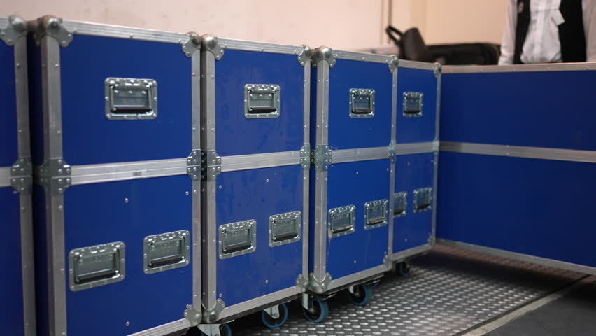 Crew loading Flightcases into the Truck after a Gig .