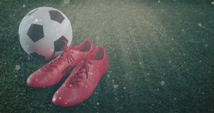 Animation of light spots over sports shoes and football. Global sport and digital interface concept digitally generated video.