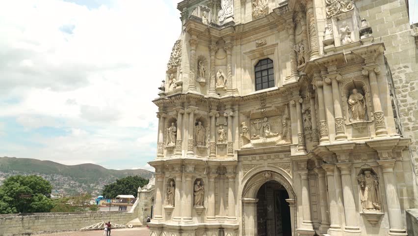 Slider in slow motion of Basilica of Our Lady of Solitude is a Roman Catholic Basilica with Baroque style built in 1682, next to Dance Square and Municipal Palace. Oaxaca, Mexico.