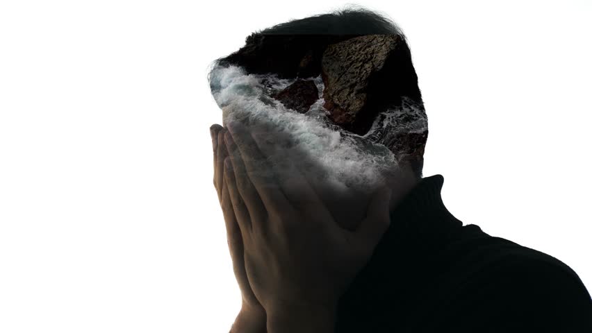 Computer graphics and double exposure. A translucent man covers his face with his palms and a storm rages in his head. Anxiety concept. Visualization of destructive grief and despair | Shutterstock HD Video #1102166817