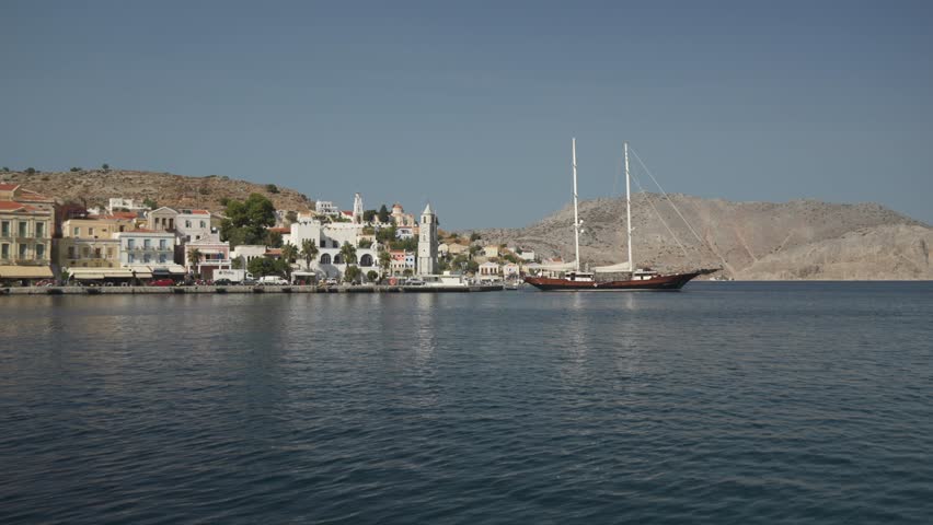 Colourful houses in Symi Harbour, Symi Town, Symi Island, Dodecanese Islands, Greek Islands, Greece, Europe