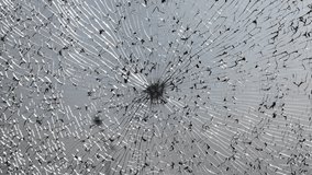 Broken windshield of a car close-up as a background. Texture broken glass with cracks.  - Powered by Shutterstock - Get 15% off with code: PIKWIZARD15