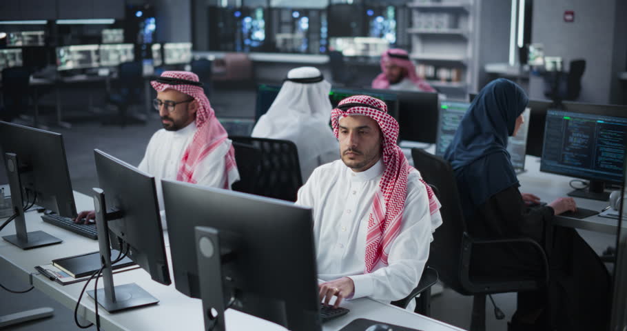 Diverse Middle Eastern Software Development Department Working on an Digital Financing Tool for an Investment Company. Group of Muslim Web Engineers Create an AI with Reinforced Learning Techniques Royalty-Free Stock Footage #1102169159