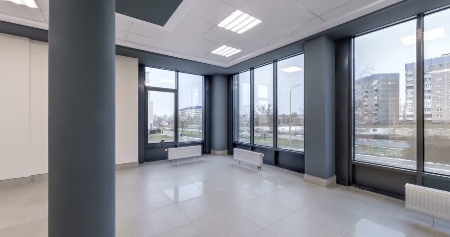 loop rotation and panoramic view in empty modern hall with columns, doors and panoramic windows overlooking the city. Royalty-Free Stock Footage #1102178811