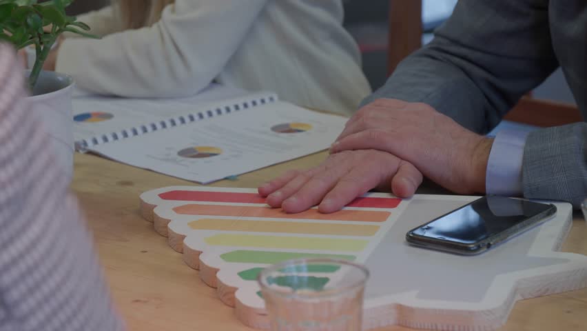 energy pass logo and male hands at office meeting