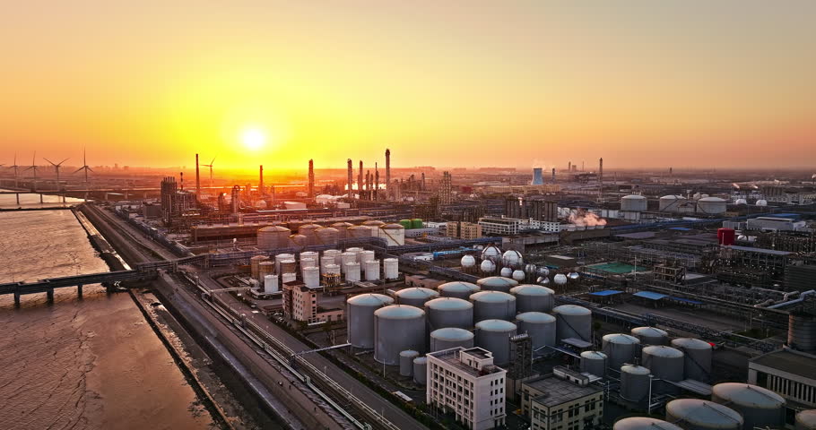 Aerial view oil terminal storage tank, White oil tank storage chemical petroleum petrochemical refinery product at oil terminal. Royalty-Free Stock Footage #1102179599