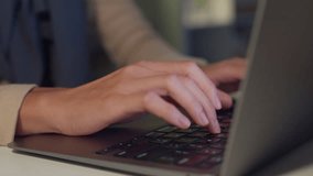 Close-up young Asia muslim freelancer women wear hijab casual cloth finger typing keyboard laptop at home office overtime working at night. Small business owner online marketing e-commerce concept. - Powered by Shutterstock - Get 15% off with code: PIKWIZARD15