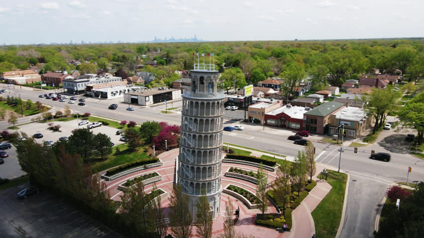 orbiting aerial of a replica statue leaning tower of Pisa in Niles, Illinois. Chicago suburbs Royalty-Free Stock Footage #1102184057