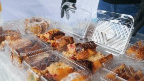 Detail shot of cakes packed in plastic cases