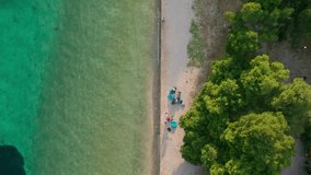 Drone shot of ocean beach, top down, slow motion 50 fps