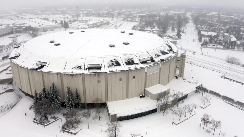 Edmonton, Alberta, Canada. Aerial view of the Northlands Coliseum Arena (Edmonton Oilers old home arena). A drone is flying around the Northlands Coliseum arena in Edmonton