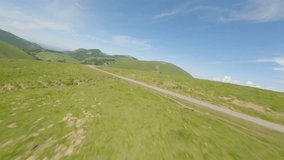 Green pastures at Iraty, Pyrenees Atlantiques in France. Aerial fpv