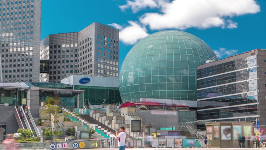 Modern skyscrapers timelapse in famous financial and business district of Paris - La Defense. Stairs and escalator with people at summer day
