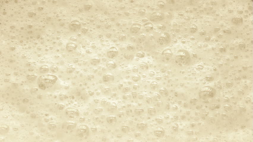 Vanilla Milkshake Bubbles Popping Closeup Royalty-Free Stock Footage #1102198995