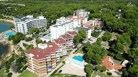 Hotels on the beach in Salou, Spain shoreline, aerial footage