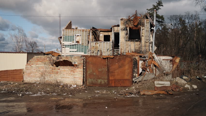 War in Ukraine, ruins of house, Aftermath bombing. Buildings destroyed due to war in ukraine, collapsed buildings in disaster scene, houses ravaged by bombing, aftermath of war in ukraine.