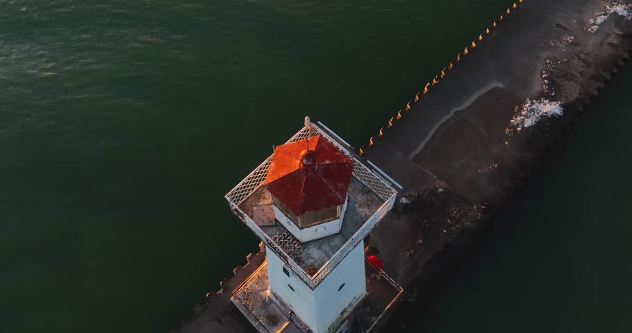 Early winter morning aerial video of Sodus Point Lighthouse, Sodus, New York.