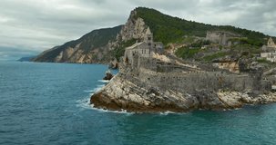 An aerial video of the castle on the sea shore, Porto Venere, Ligurian coast, Italy