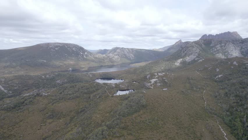 Scenery Of Dove Lake Across Wombat Pool Rest Area And Lake Lilla In Cradle Mountain, Tasmania. wide aerial