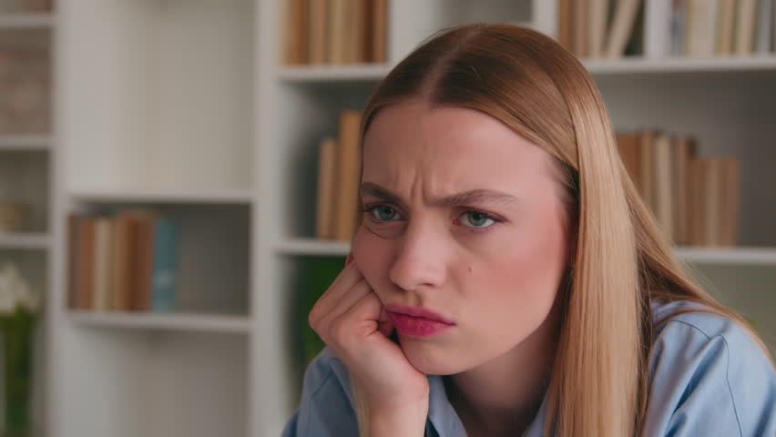 Close up portrait stress offended woman boring dissatisfied looking at camera shake head no rejection deny. Headshot Caucasian girl bored with work office student stressful sad upset annoyed grimace Royalty-Free Stock Footage #1102217101