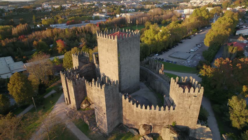 Slow far to close up drone shot of the Guimaraes Castle