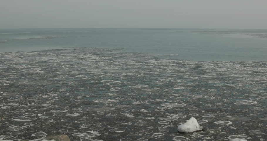 Lake Superior in Winter with Ice Floes Moving in Water