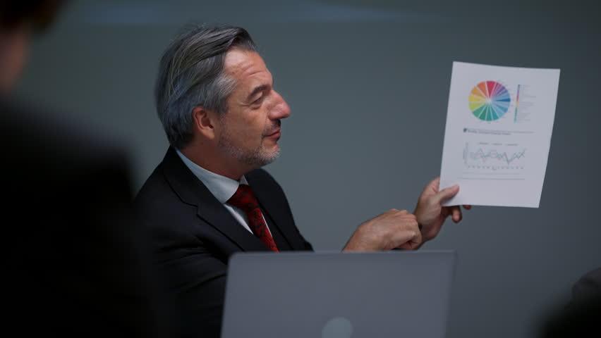 Business people brainstorming and meeting together in conference room