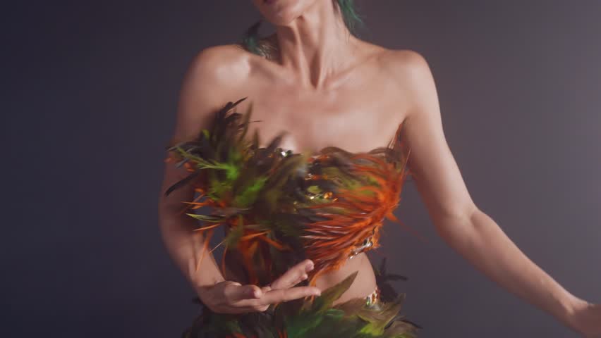 sexy body and beautiful face of attractive belly dancer woman, performing traditional choreography