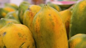 Papaya in supermarket. Close up. - Powered by Shutterstock - Get 15% off with code: PIKWIZARD15