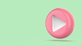 Spinning green play button on pink background