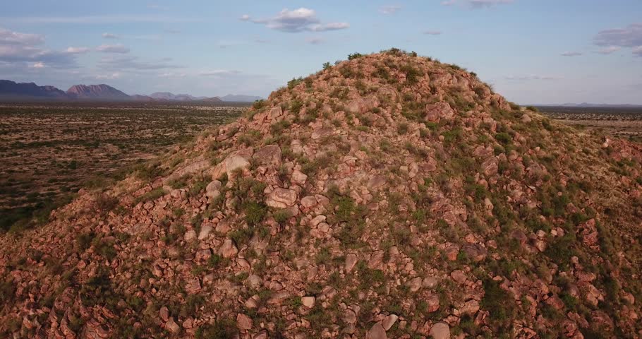 4K aerial drone video of African savanna hill and rocky outcrop south of Windhoek near Rehoboth off main B1 highway in Namibia, southern Africa