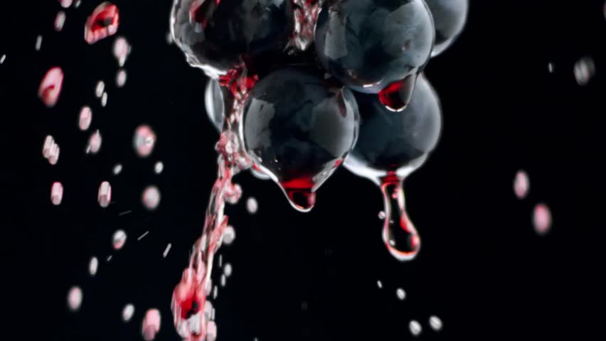 Fresh black grapes rotation on black background Grapes close up. Loop motion. Beautiful stock footage for wine commercial. Taste Luxury Grapes. Quality Creative Vine. Red wine flows on a ripe grape. Royalty-Free Stock Footage #1102237365
