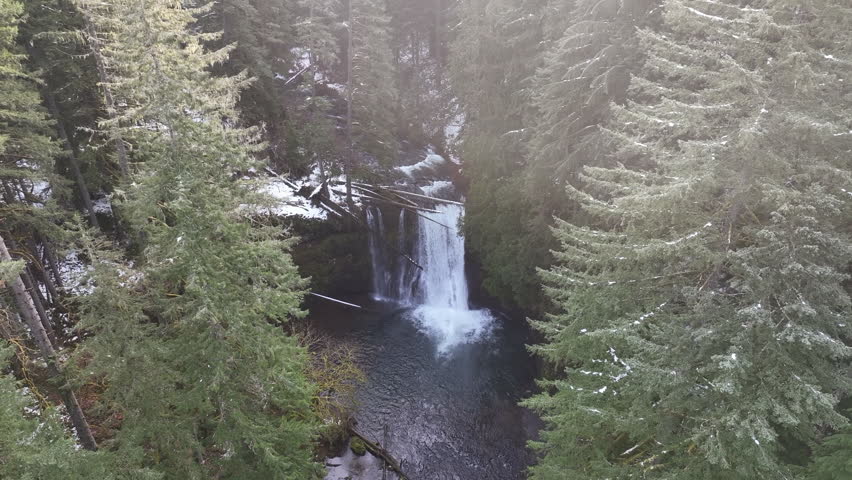 Silver Creek tumbles over the beautiful Upper North Falls near Silverton, Oregon. This heavily forested, scenic area, which has many impressive waterfalls, is about an hour drive south of Portland.