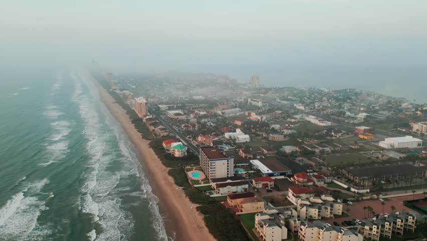 Aerial wide shot of South Padre Island, TX morning time Royalty-Free Stock Footage #1102240839