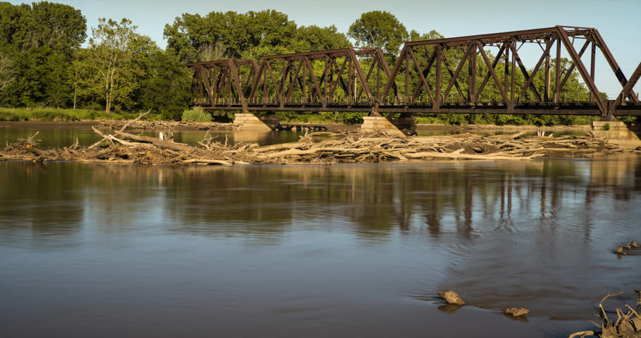 Iron through truss bridge crosses the Des Moines River from Ottumwa Iowa to Turkey Island.  Train bridge built in 1911.