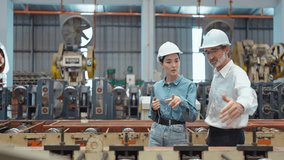 Workers partners holding tablet walking at manufacturing factory manager leader industrial specialist discussing project work with woman engineer warehouse. Teamwork concept - Powered by Shutterstock - Get 15% off with code: PIKWIZARD15