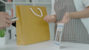 Customer use smartphones to scan QR codes to pay in-store with digital payments without cash. scanning get discounts. E wallet, technology, online payment, banking app, smart city, money transfer - Powered by Shutterstock - Get 15% off with code: PIKWIZARD15