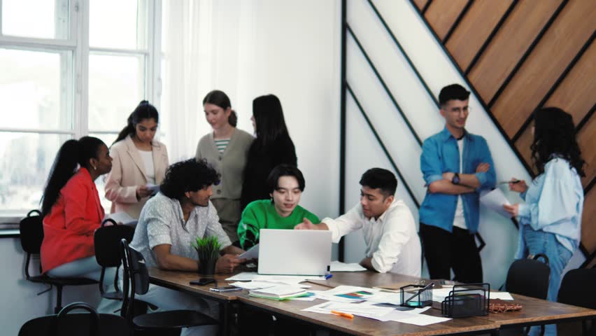 Student guys sit at table prepare for exam with laptop, write essay, text coursework using computer sit at public or college library, make research, do homework. Gen Z, tech, education concept Royalty-Free Stock Footage #1102275069