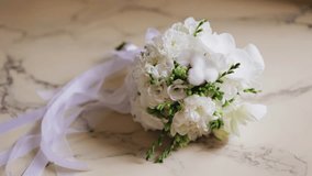 A bouquet of fresh flowers is on the table. The camera captures him in motion - Powered by Shutterstock - Get 15% off with code: PIKWIZARD15