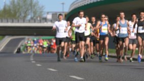 blur marathon runners in 4K slow motion 60fps