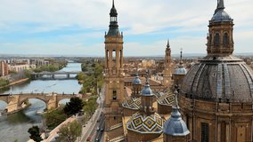 Aerial view on the roofs of Basilica of Our Lady of the Pilar in Zaragoza, Spain. High quality 4k footage