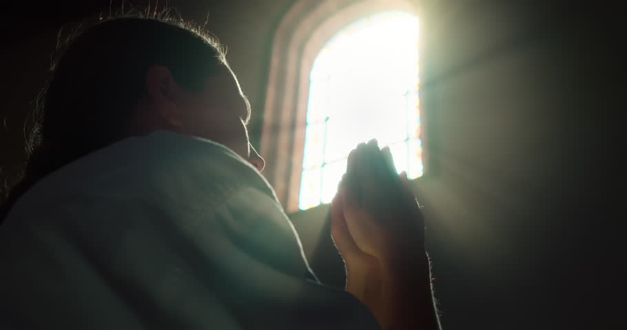 Sinner woman knelt down to pray to God in church temple. Religious faith and spirituality. Spirit of christianity and belief in the Goodness of God. Royalty-Free Stock Footage #1102286673