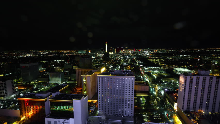 Time lapse of Las Vegas cityscape in night to day transition wide angle Royalty-Free Stock Footage #1102287357