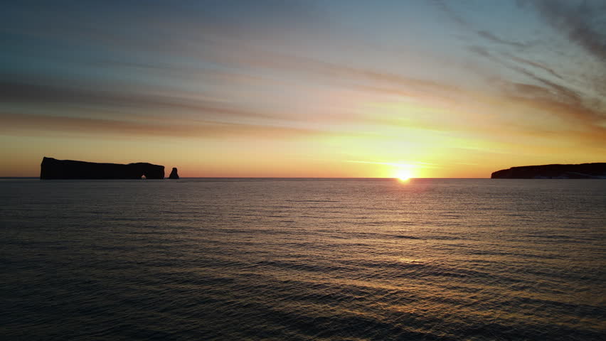 Drone view at sunrise of famous perce rock in Percé, Québec, Canada
