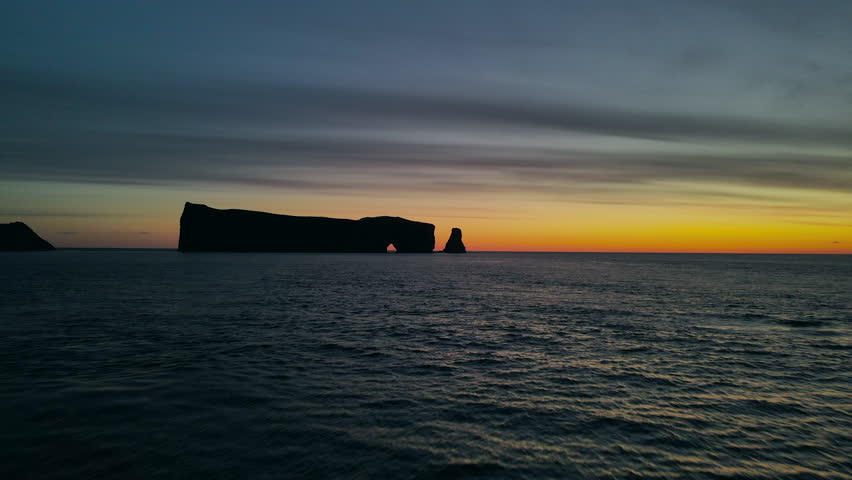 Drone view at sunrise of famous perce rock in Percé, Québec, Canada