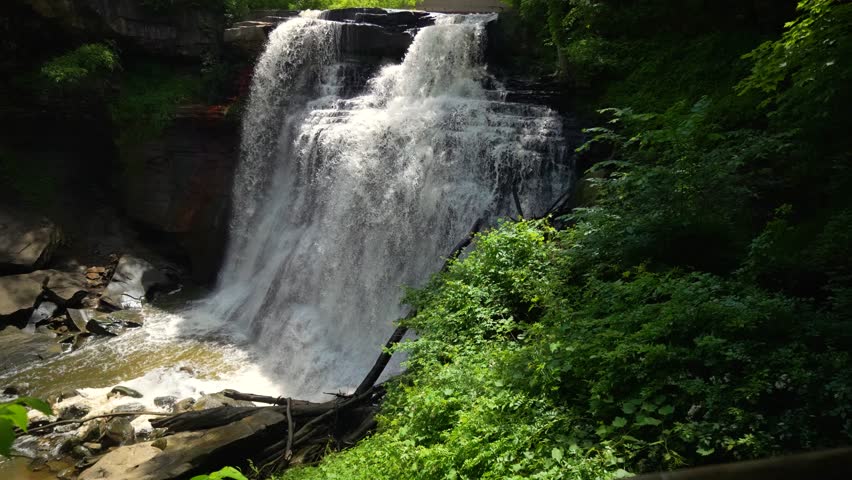 Cuyahoga Valley National Park Powerful Brandywine Falls River Rocks Waterfall In Dark Green Wooded Forest
