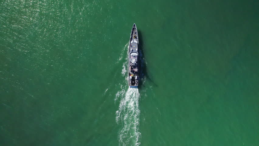 Weymouth, Dorset. UK April 4th 2023. UK Border patrol ship sailing along iconic British coastline on sunny day