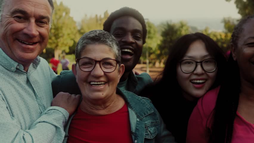Happy multigenerational people with different ethnicity having fun smiling into the camera - Diversity concept  Royalty-Free Stock Footage #1102305239