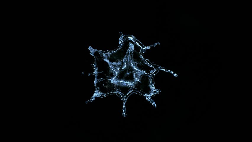 Super slow motion of splashing water isolated on black background. Filmed on high speed cinema camera, 1000 fps.