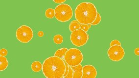 Abstract explosion with Tangerine slices flying in different directions on a green background. Creative colorful food animation concept with fruits - Powered by Shutterstock - Get 15% off with code: PIKWIZARD15